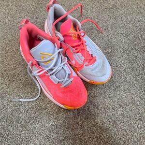 Youth Nike then Pink and Gray volleyball Shoes